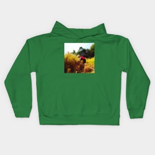 harvesting rice on the fields Kids Hoodie